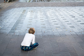Studying the water fountain at Granary Square.