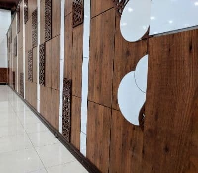 Interior Wall Cladding in HPL with laser cut architectural design
