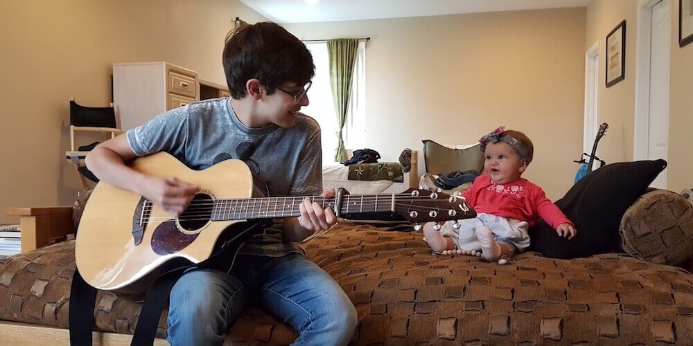 Playing guitar for my niece Hannah