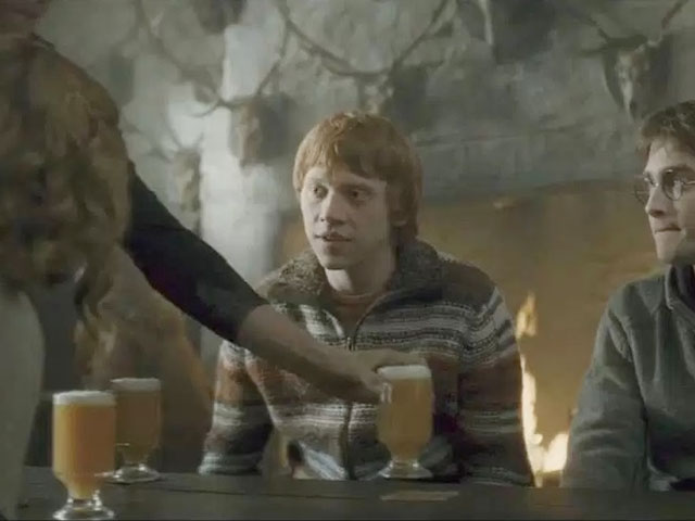 Harry Potter, Hermoine Granger and Ron Weasley being served 3 pints of Butterbeer
