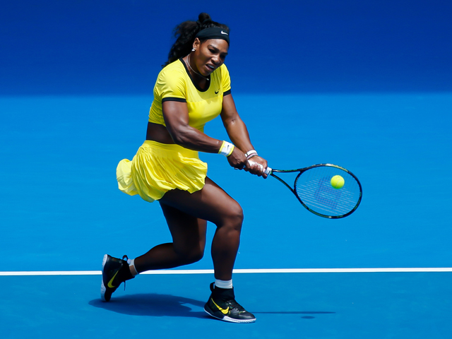 Serena Williams making a groundstroke on the hard court