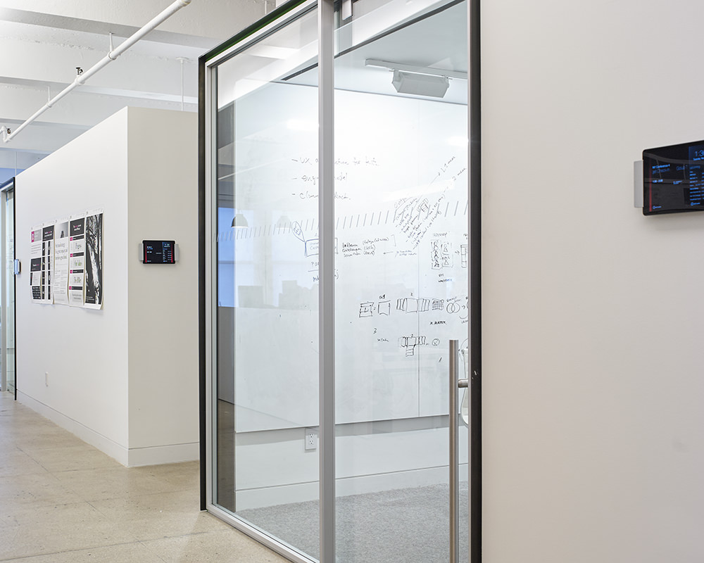 Office Hallway with Glass Wall Panels