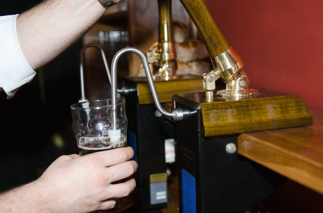 Picture of a beer being poured from a cask
