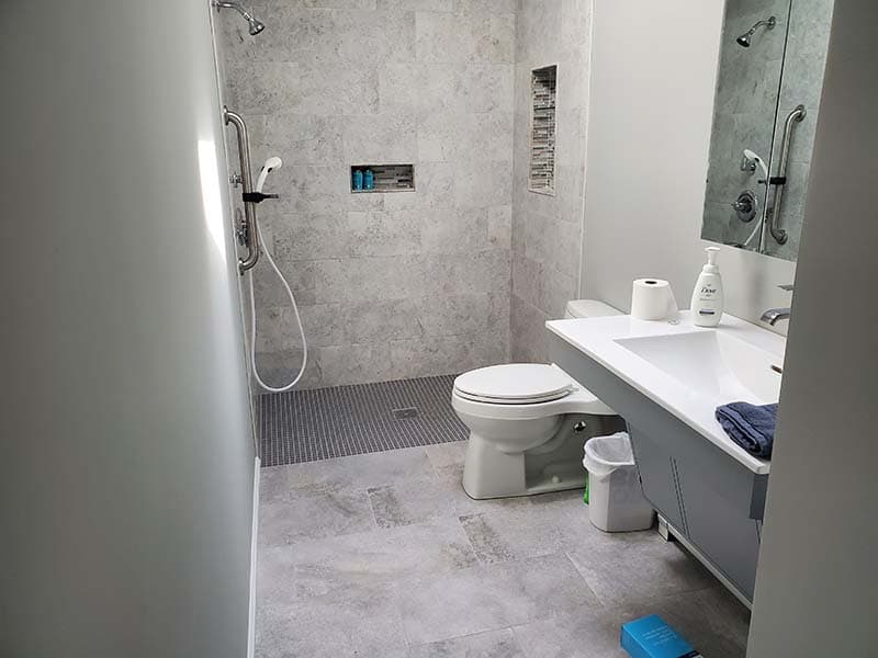 bathroom and new accessible walk-in shower after a remodel by CorHome