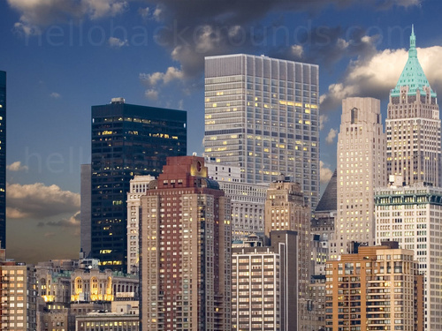 Urban cityscape at early morning featuring various tall office buildings in front of blue sky with scattered clouds Zoom background