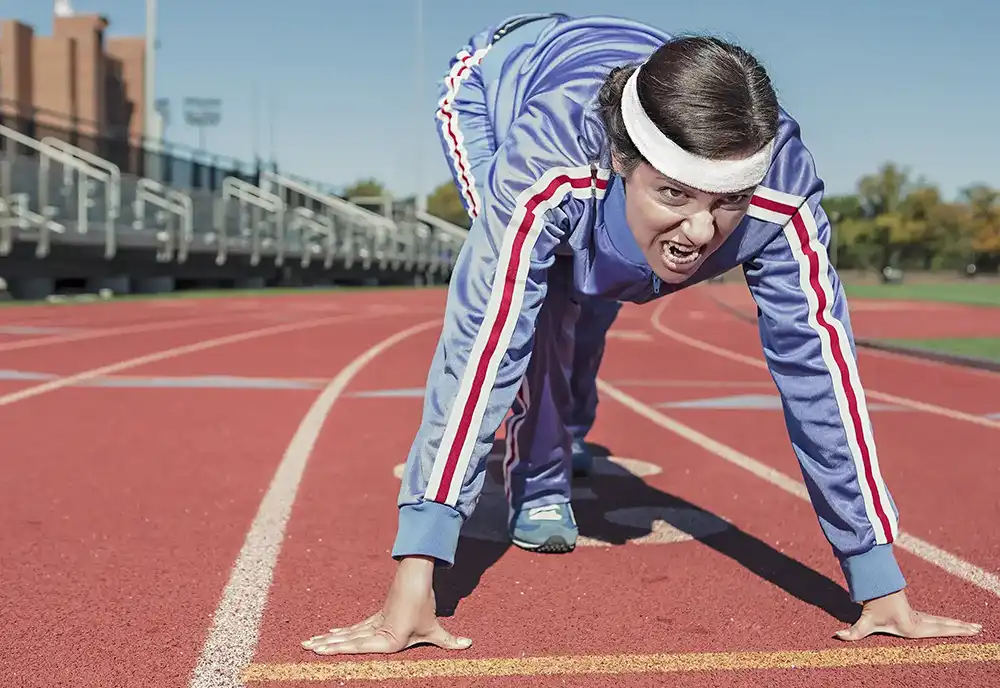 Woman in a sprinter's position