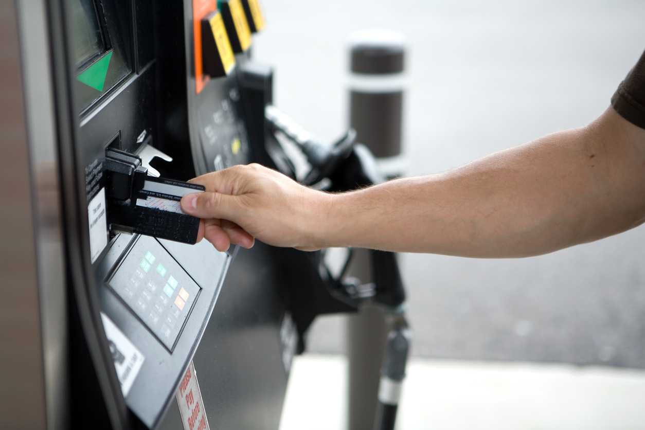 Man paying for gas with fuel card