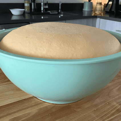 Bulk ferment for at least 6 hours at room temperature and then place the dough in the fridge to continue fermenting overnight.