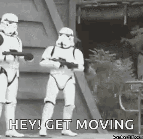 imperial storm trooper shoving another storm trooper and saying hey get moving