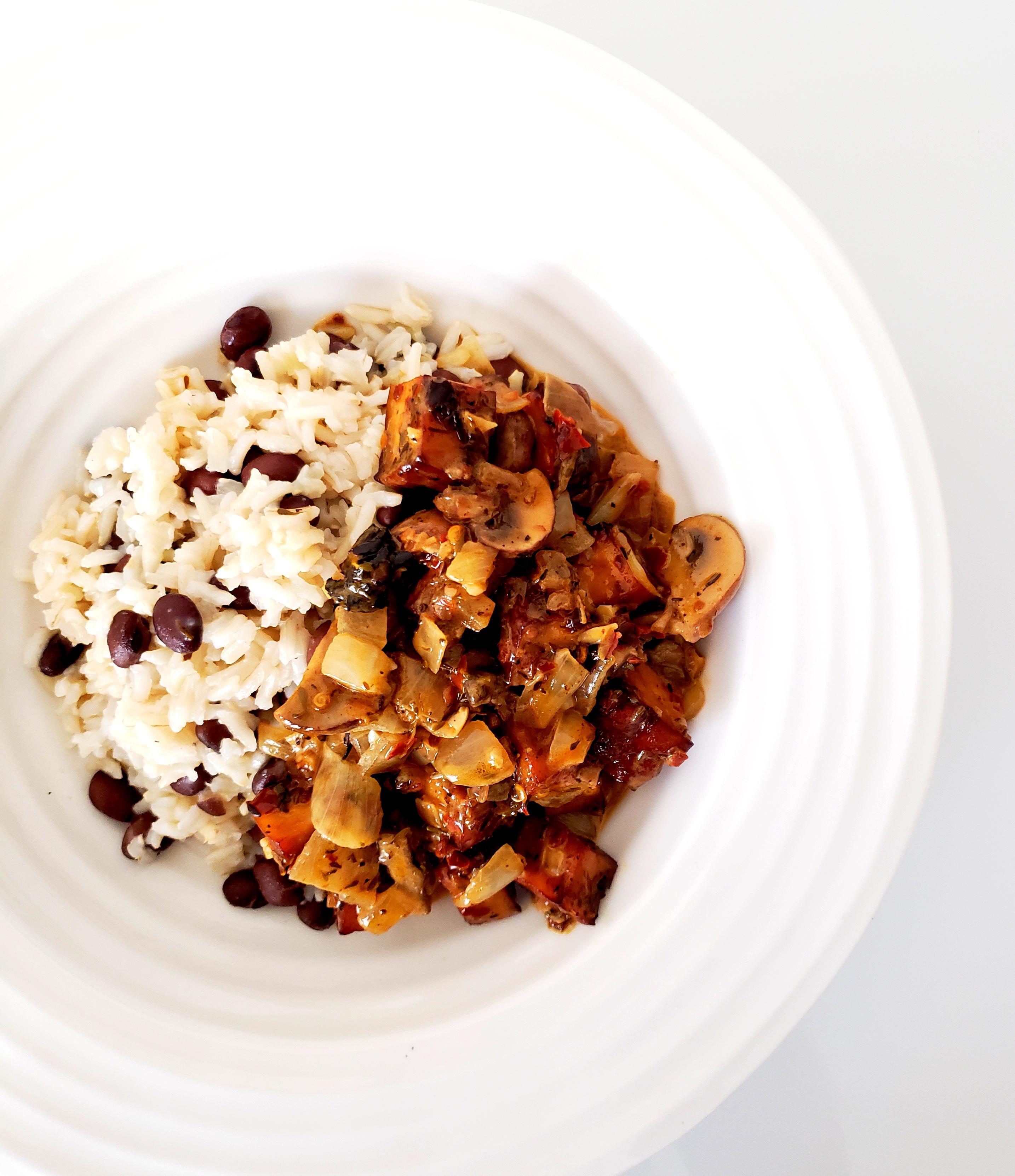 Bowl of Jerk Tofu and Mushrooms over Black Bean Rice