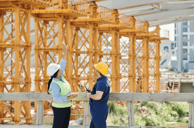 image of two people at a construction site