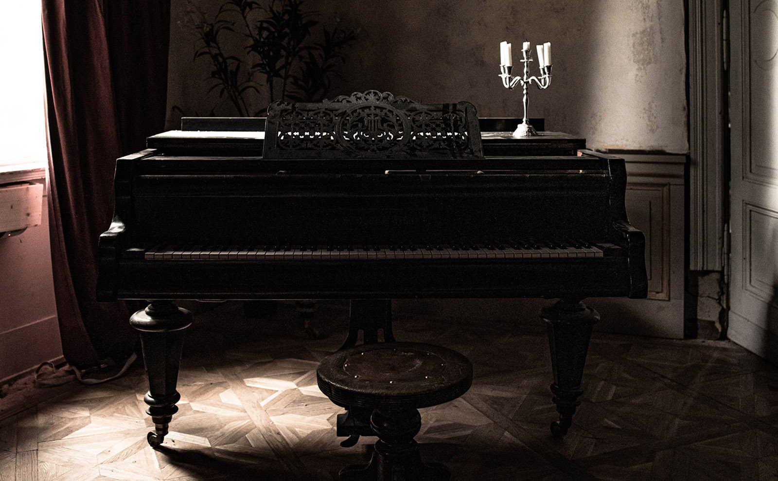 creepy piano with a candelabra