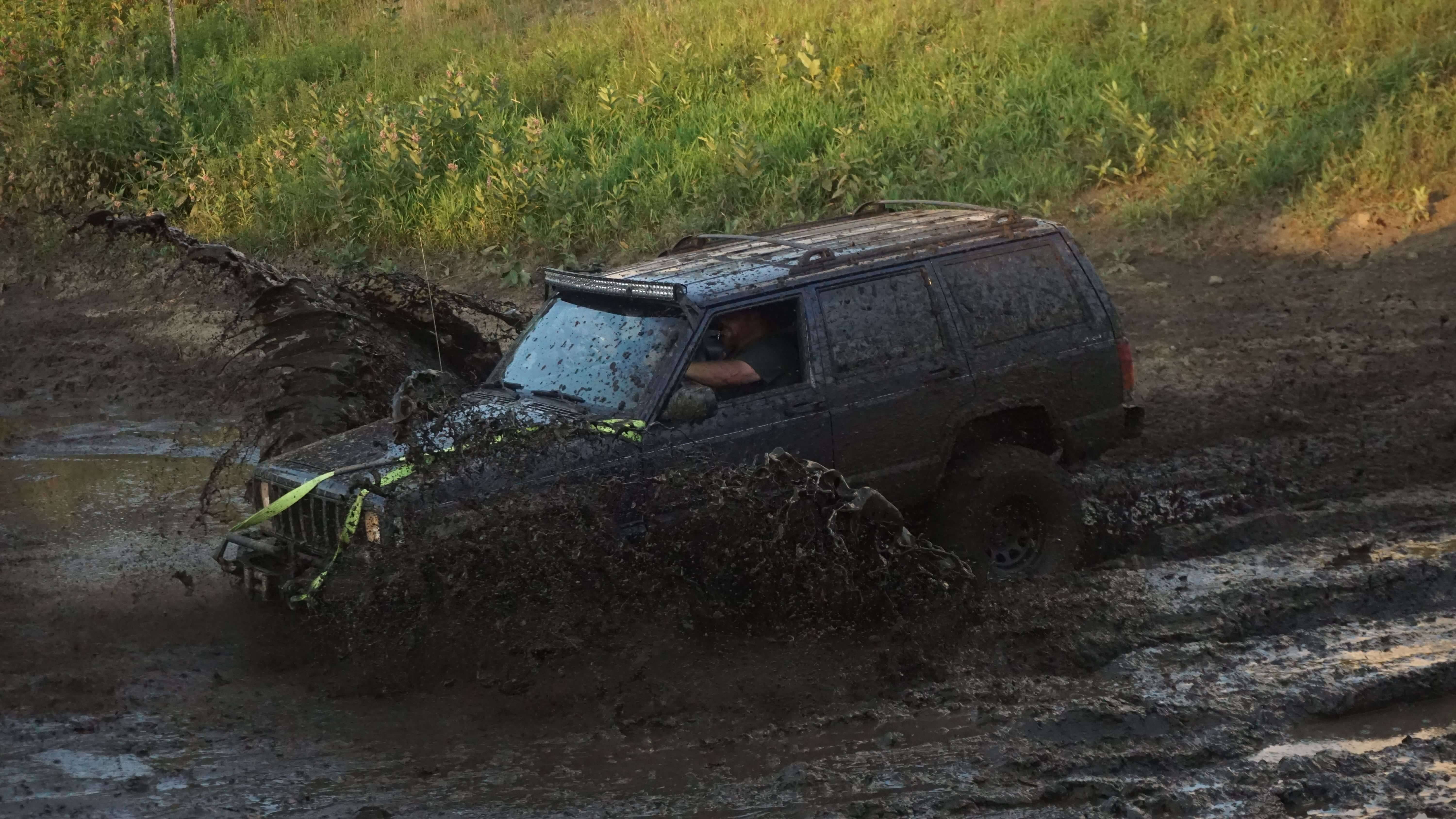 An Jeep going through the famous Mudbug