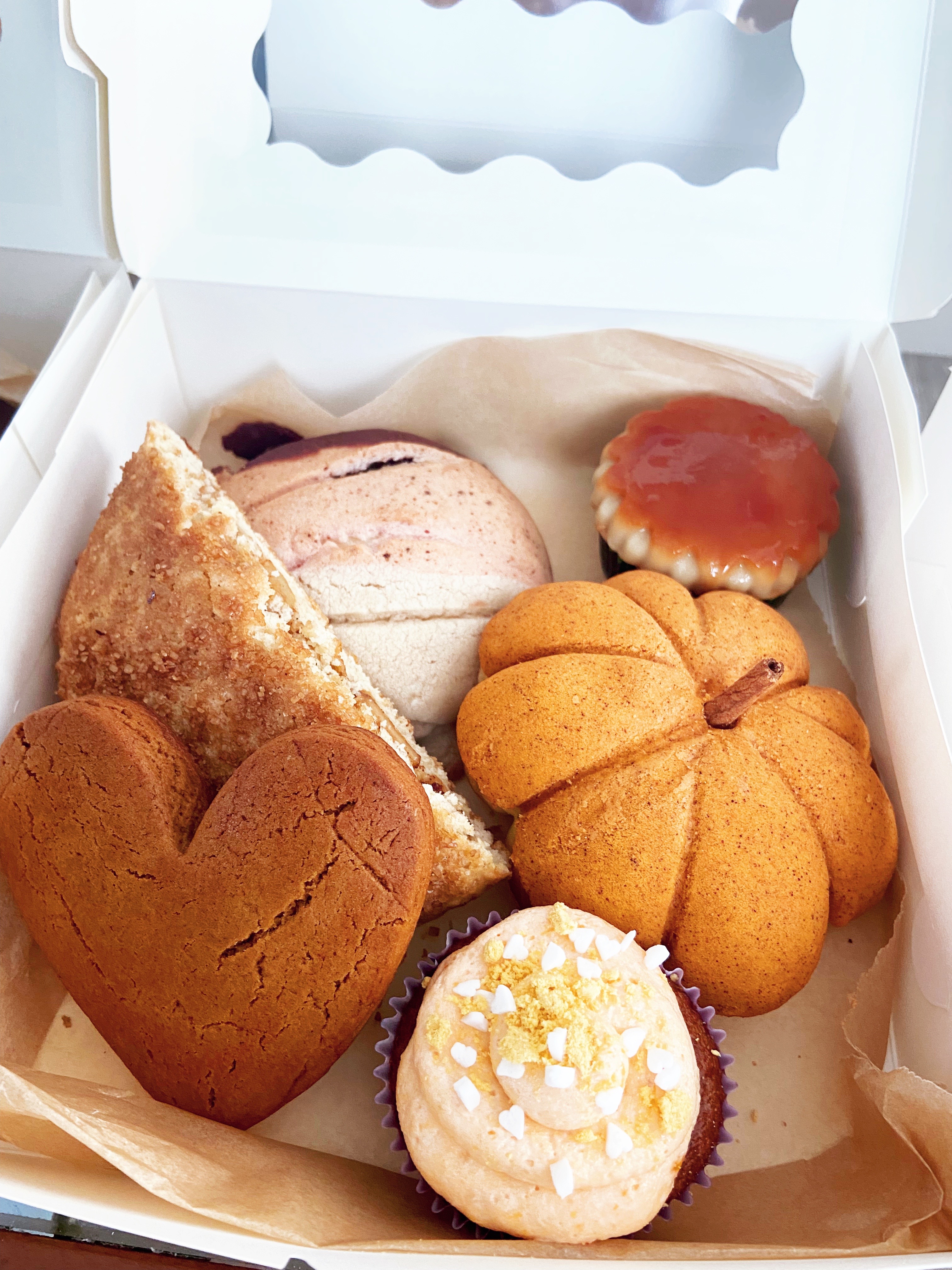 a box of assorted baked goods