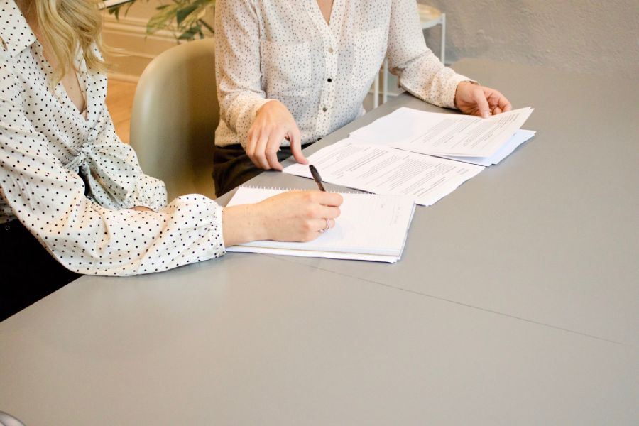 IT professional discussing findings of Cybersecurity Risk assessment with client