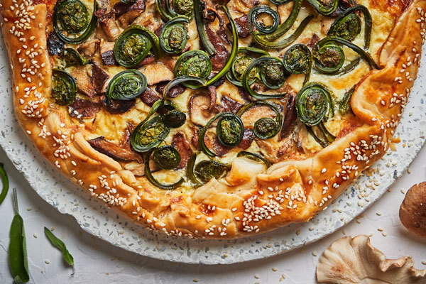 Fiddlehead and Mushroom Galette With Caramelized Onion Ricotta