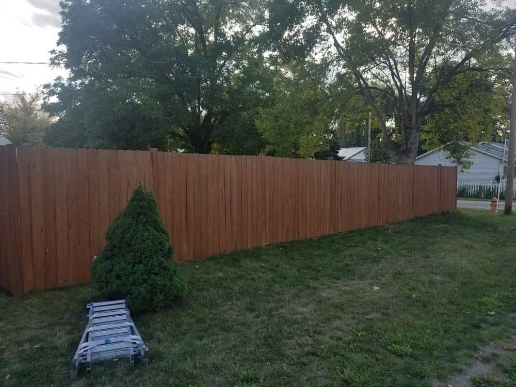 enlarged photo of brown stained fence
