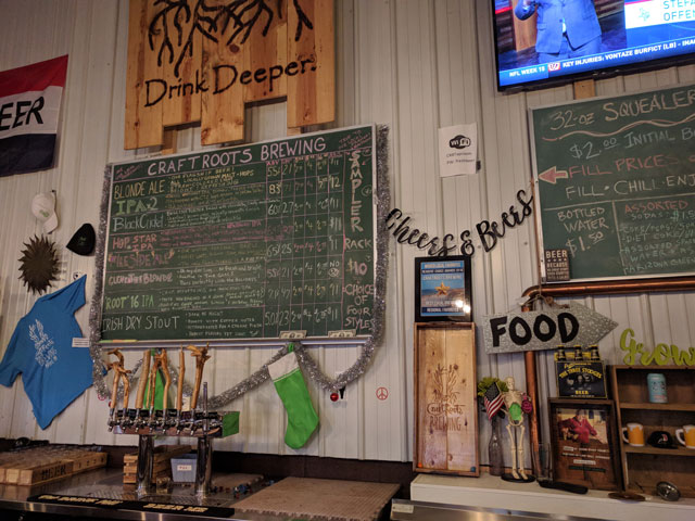 The beer taps at CraftRoots Brewing
