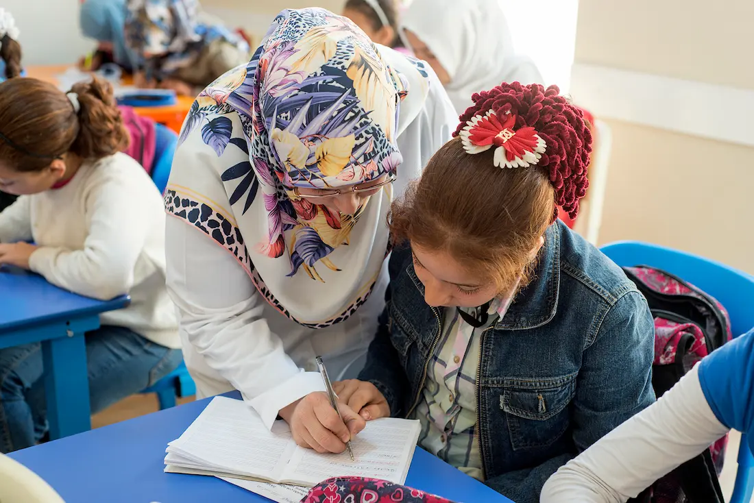 Teacher Hadice* works with 10-year-old Rania* to strengthen her Turkish skills in an Education Support Center run by Concern’s local partner in Malatya Province