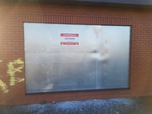 window openings secured with steel screens