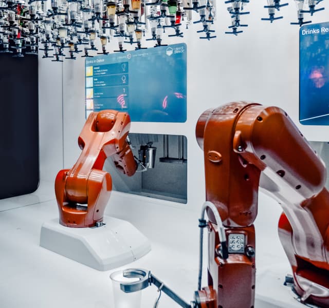 Two red power tools inside a room