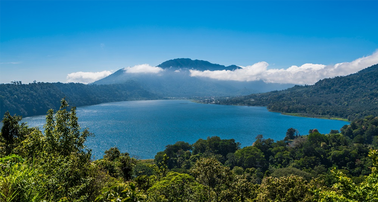 A view over Buyan Lake from Munduk, with Bedugul town in the distance.