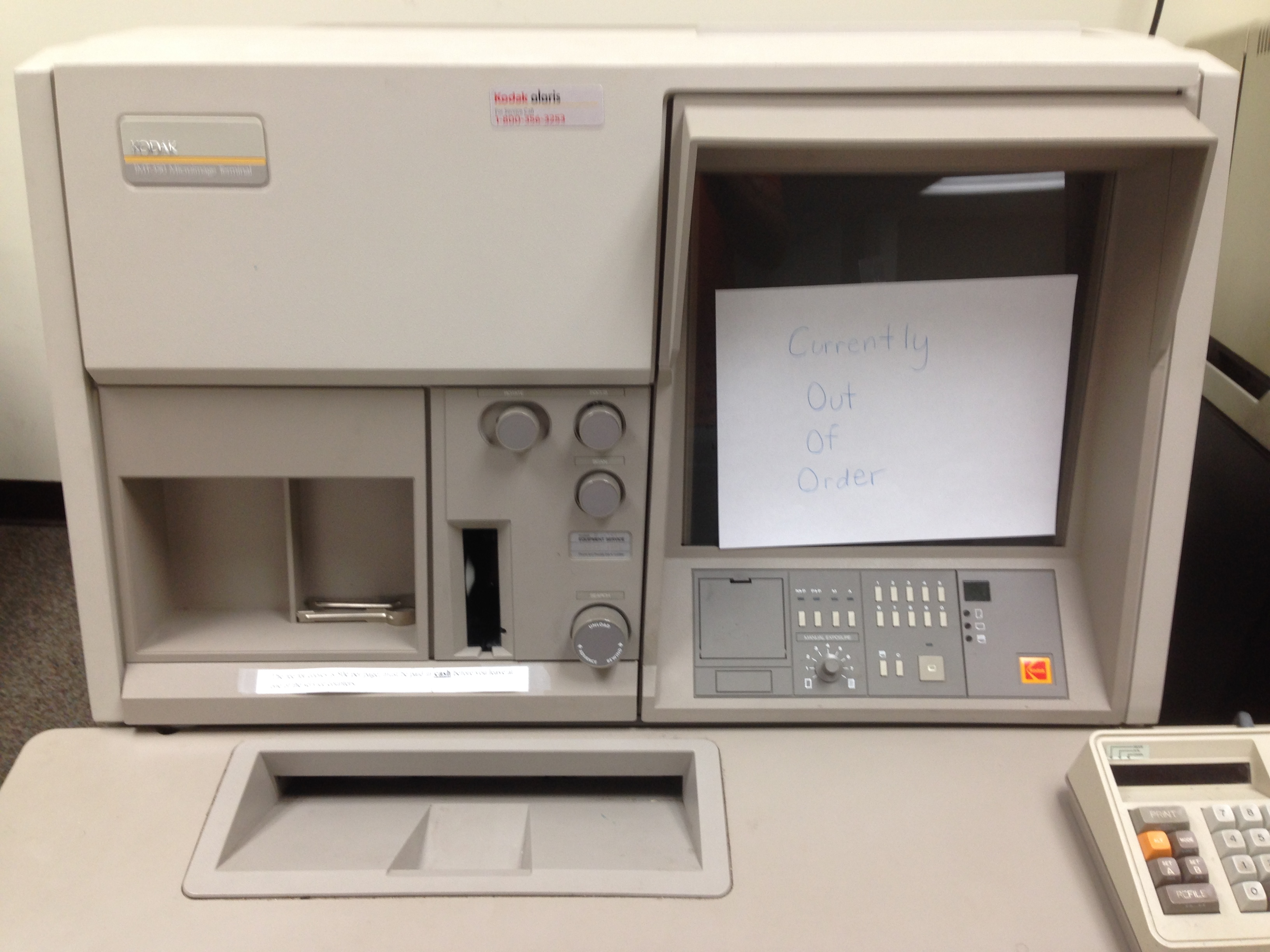 Image of Microfilm Reader with out-of-order sign