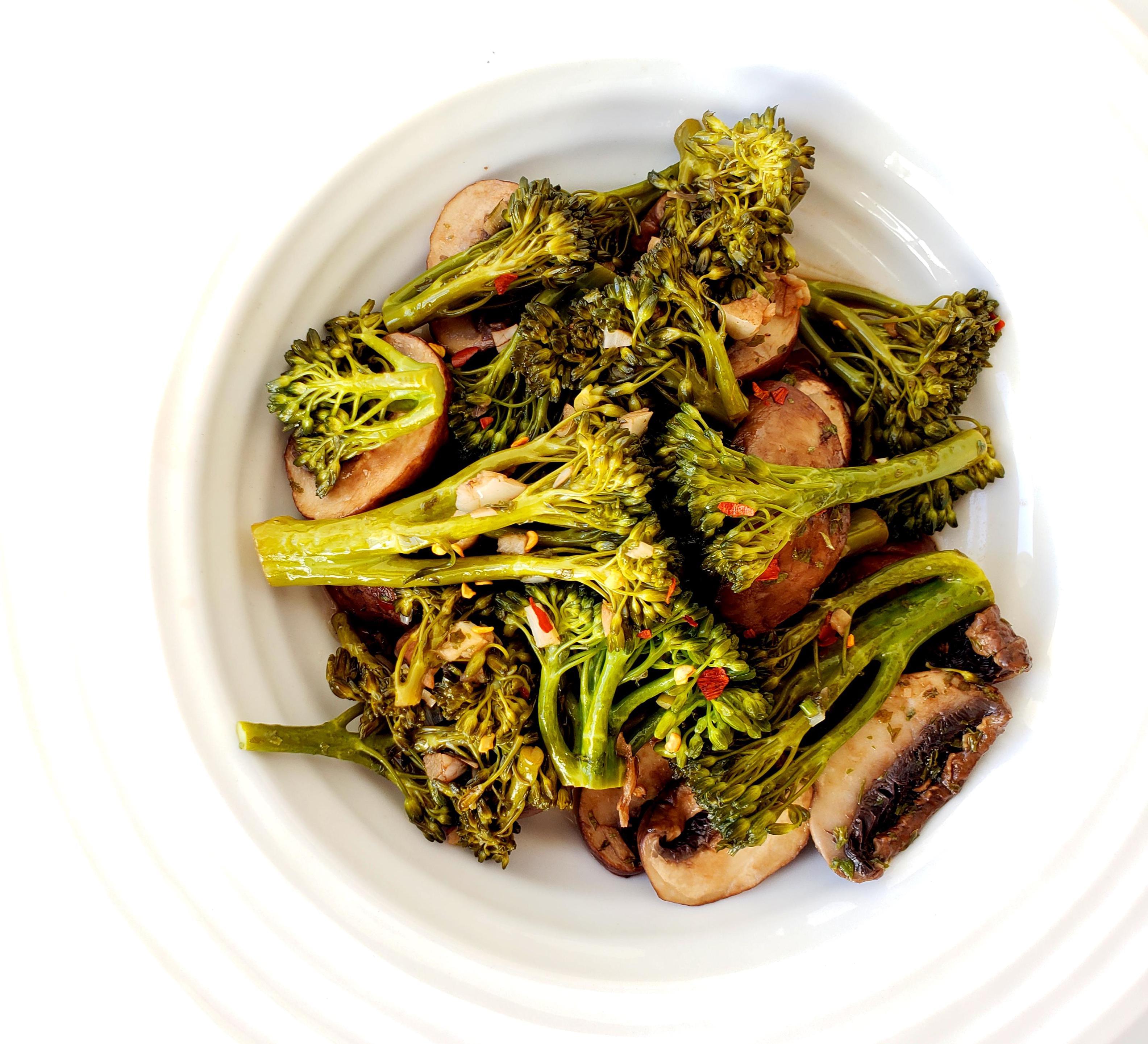 Bowl of balsamic broccolini and mushrooms with red pepper flakes