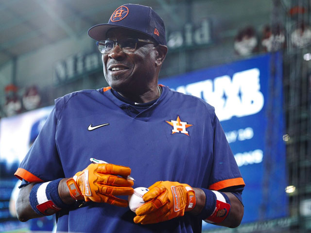 Dusty Baker wearing Orange Franklin Baseball Batting Gloves