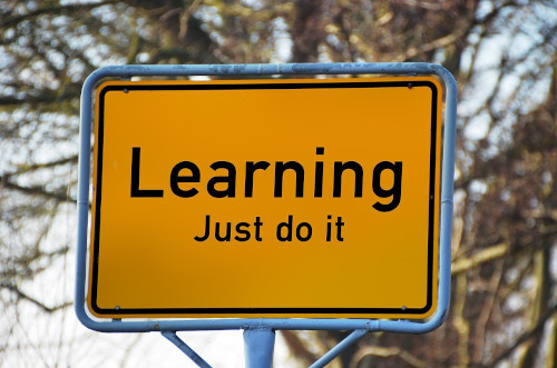Tutoring image of a sign that says Learning Just do it