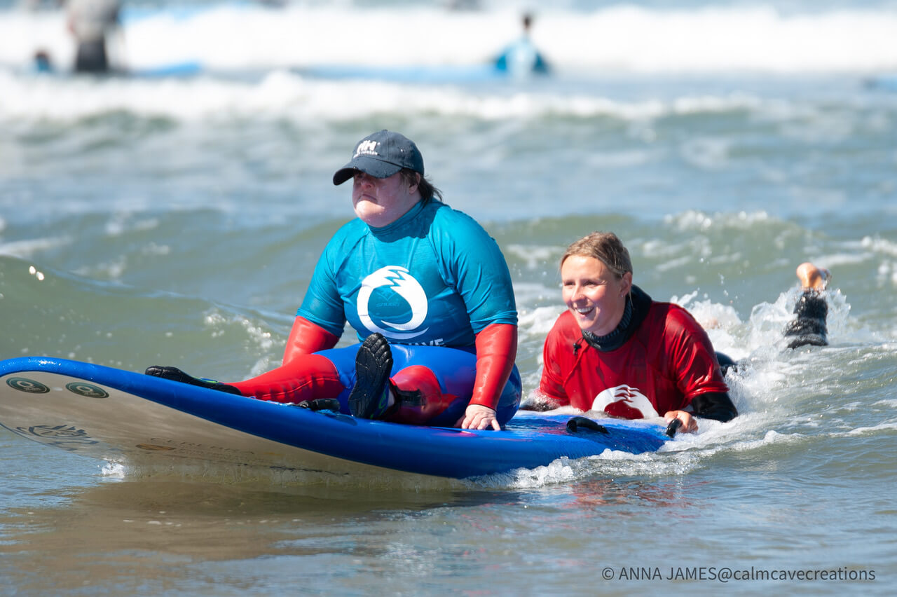 people doing adaptive surfing