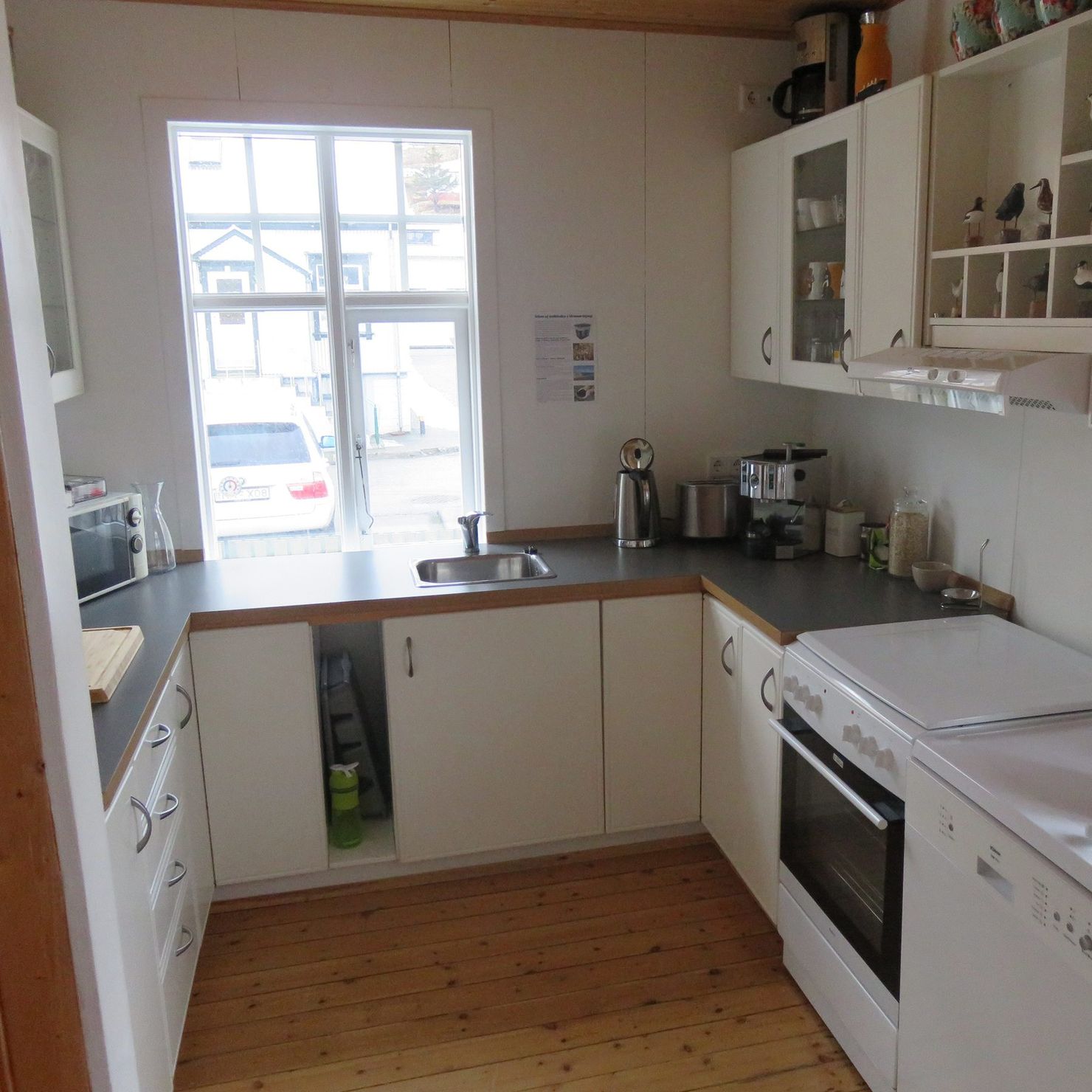 The kitchen is spacious, very bright due to the large window and perfect for cooking