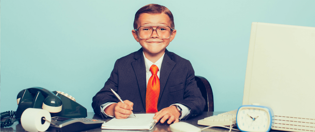 Finding an accountant with experience is vital. Here's mine. A small boy playing accountant