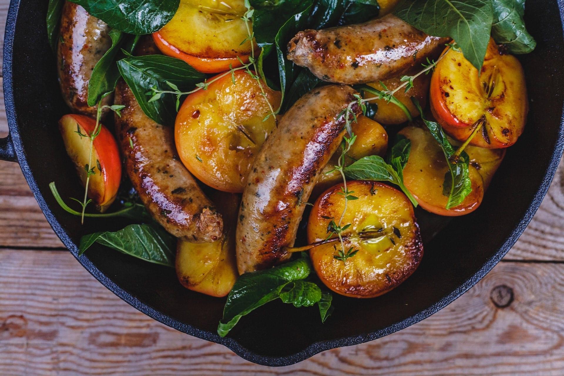 Pan Seared Sausages And Apples With Honey, Thyme And Greens
