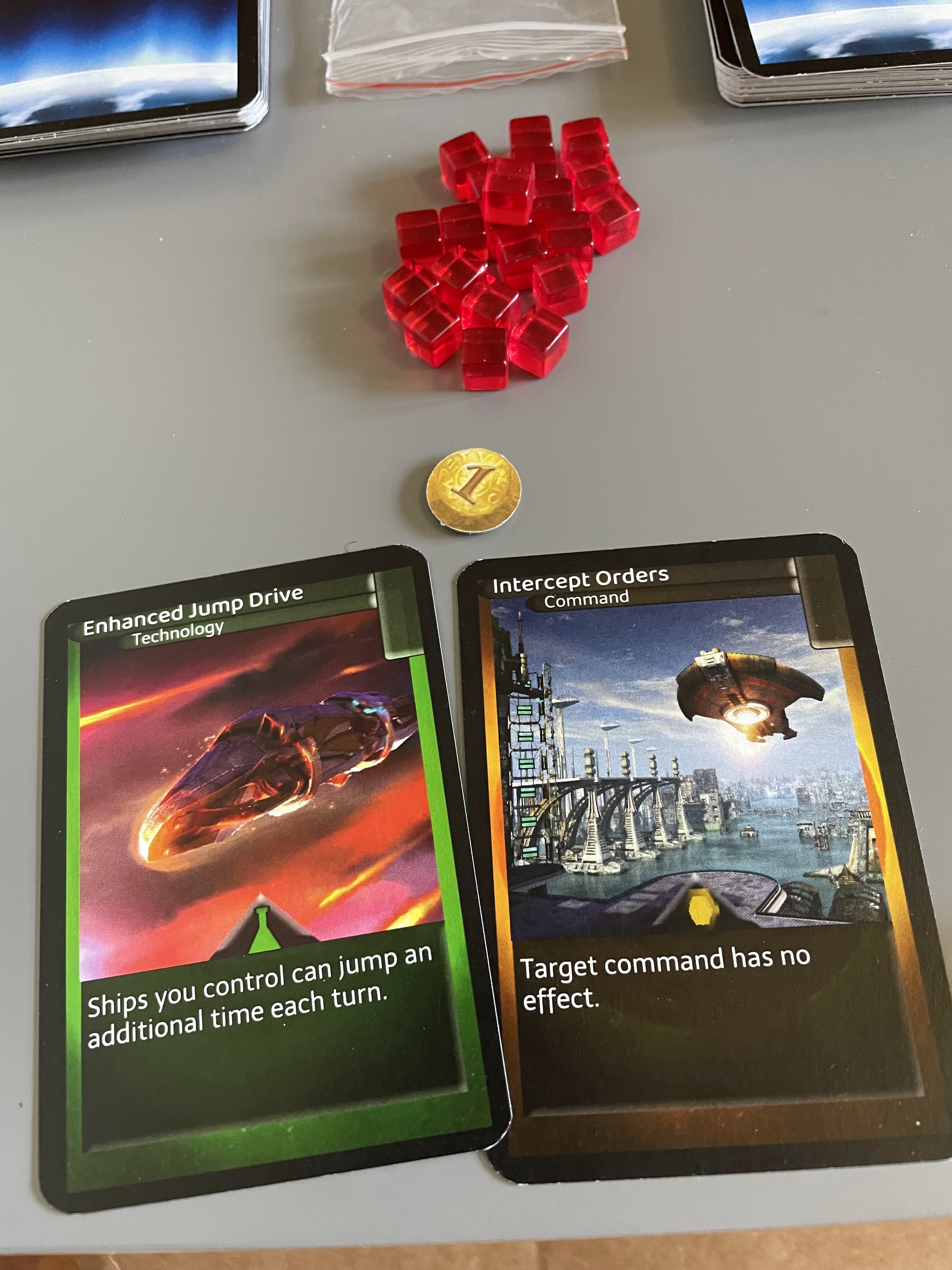 A Science card, titled Enhanced Jump Drive, and a Politics card, titled Intercept Orders.