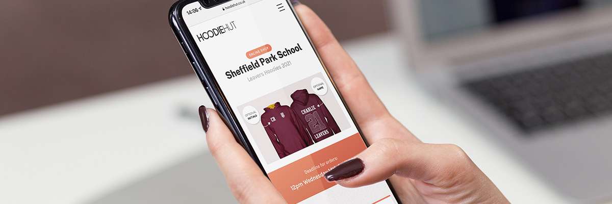 A student on iPhone ordering hoodies using our online shop