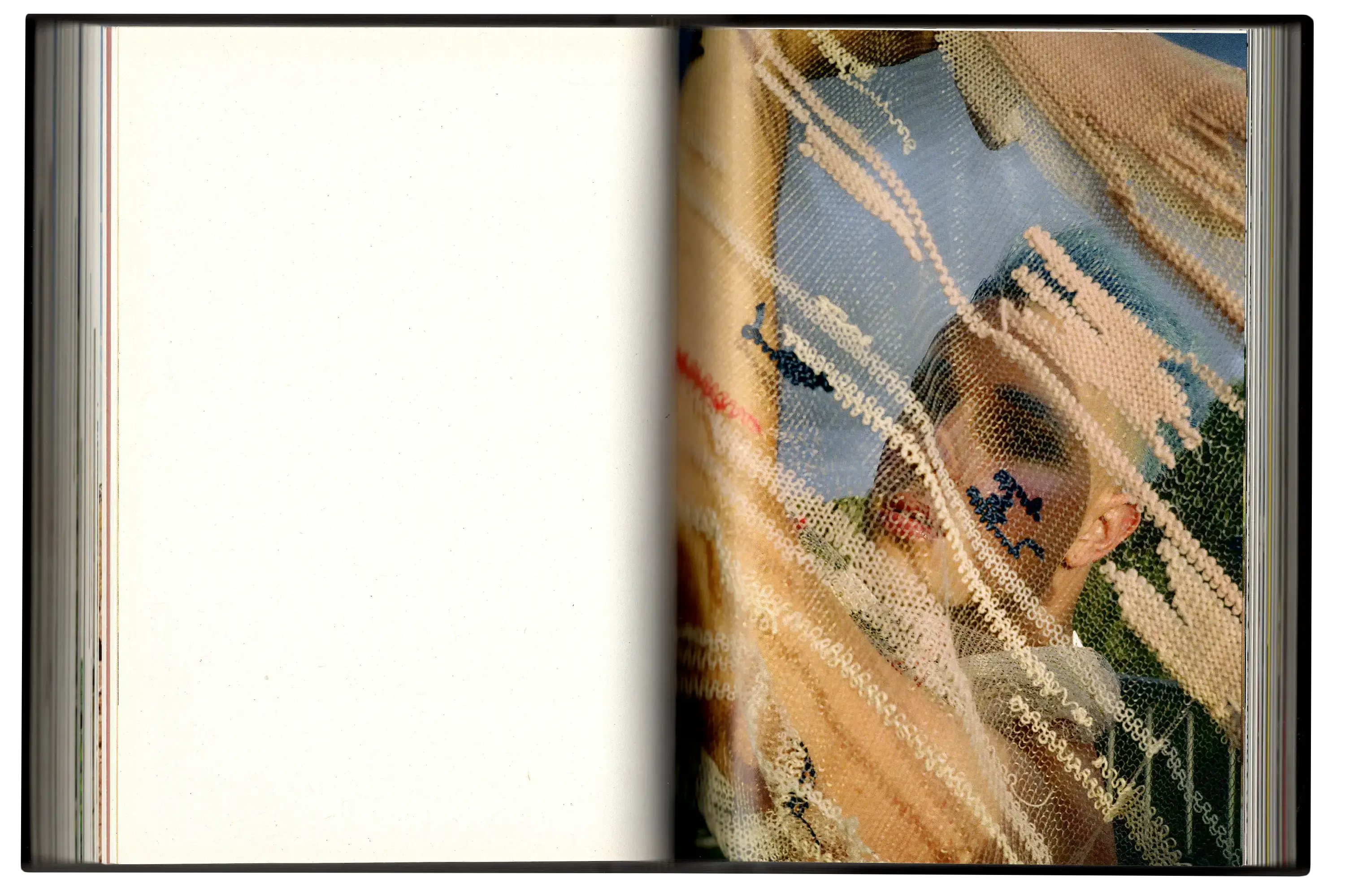 Imperfect Photo Book - blank left page, right page shows person draping fabric in front of them