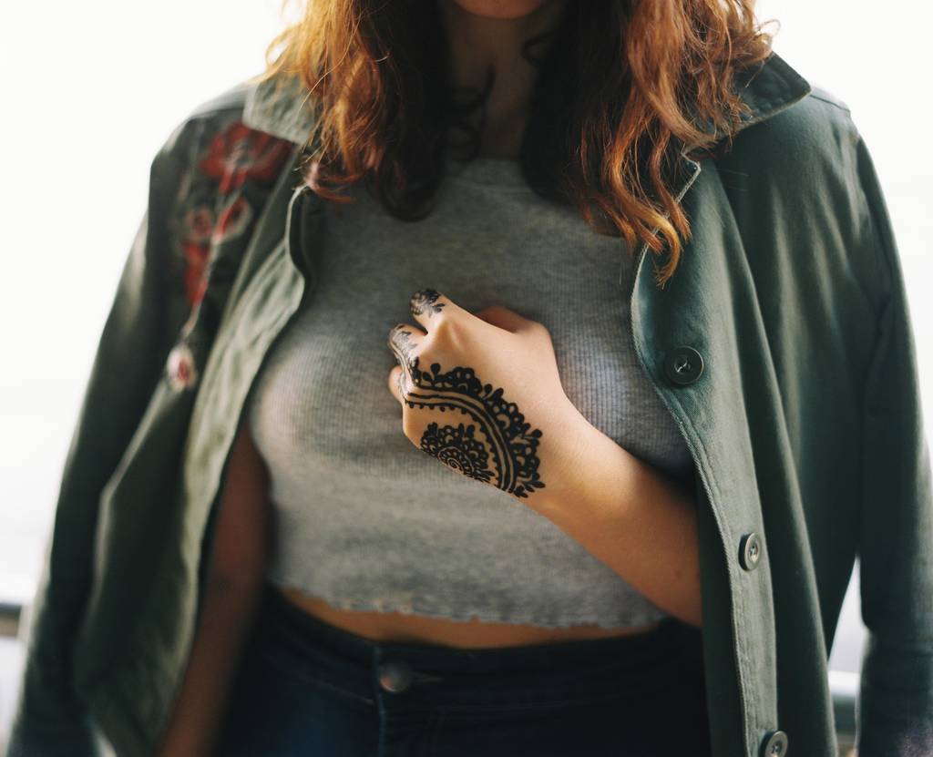 A clenched fist on the chest
