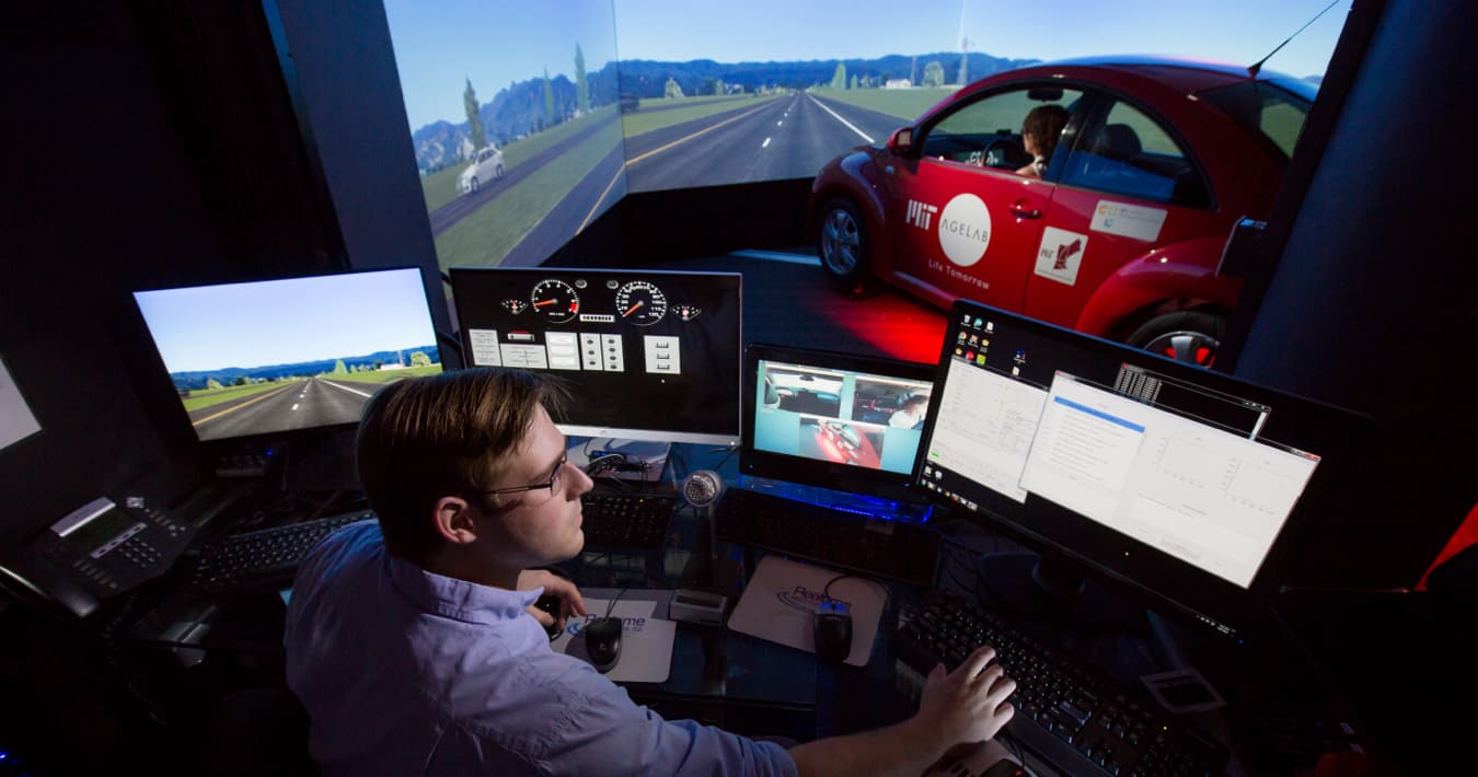 Multiple computers monitoring mock driving segment