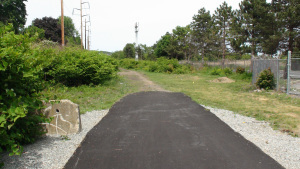 Paved bike path turning into gravel.