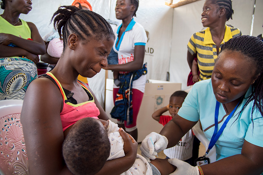 A baby being vaccinated in Liberia