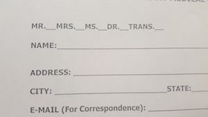A photo of a paper form asking for name, address, city, etc, including options at the top for &quot;MR.&quot;, &quot;MRS.&quot;, &quot;MS.&quot;, &quot;DR.&quot;, &quot;TRANS.&quot;