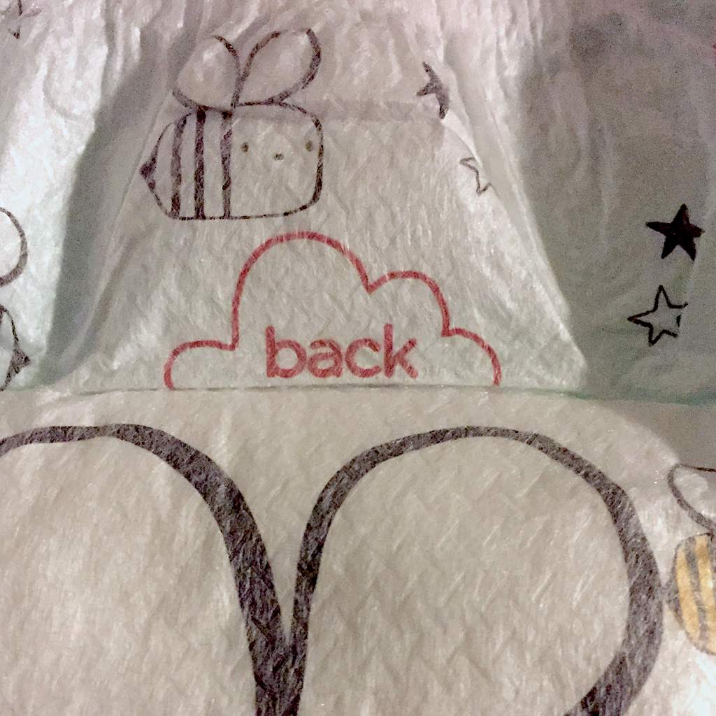 A close-up of a nappy with the word back printed on the back side