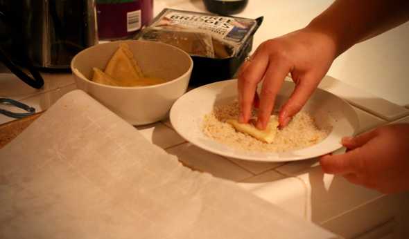 Breading the ravioli