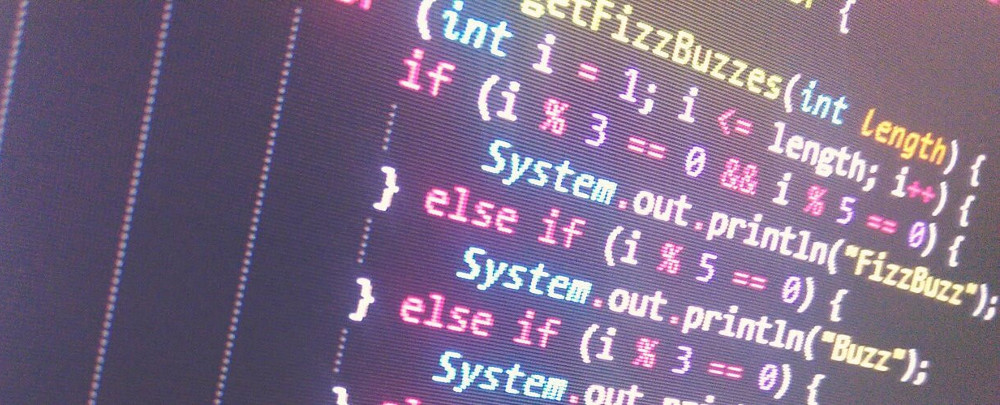 A photo of a screen showing FizzBuzz a popular albeit horribly ineffective coding exercise.