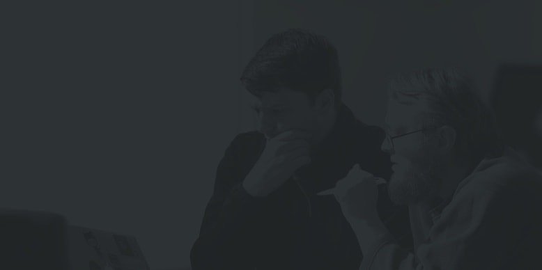 two employees working through a problem