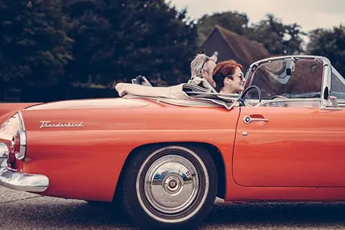 A couple in a convertible