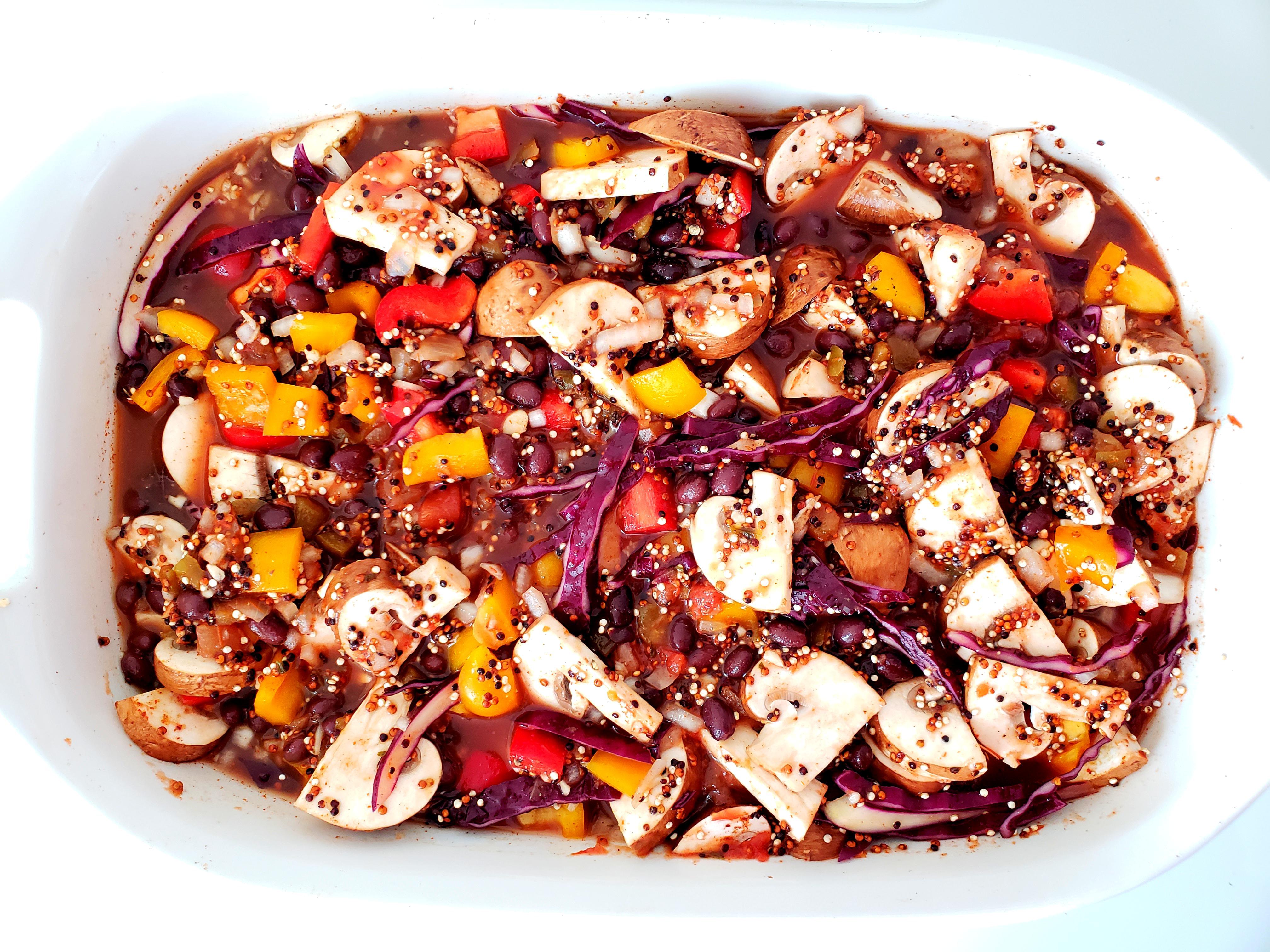Uncooked Mexican Quinoa with Vegetables in Casserole Dish