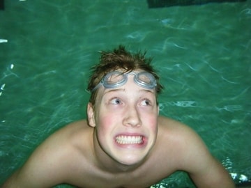 The author in a swimming pool making a silly face