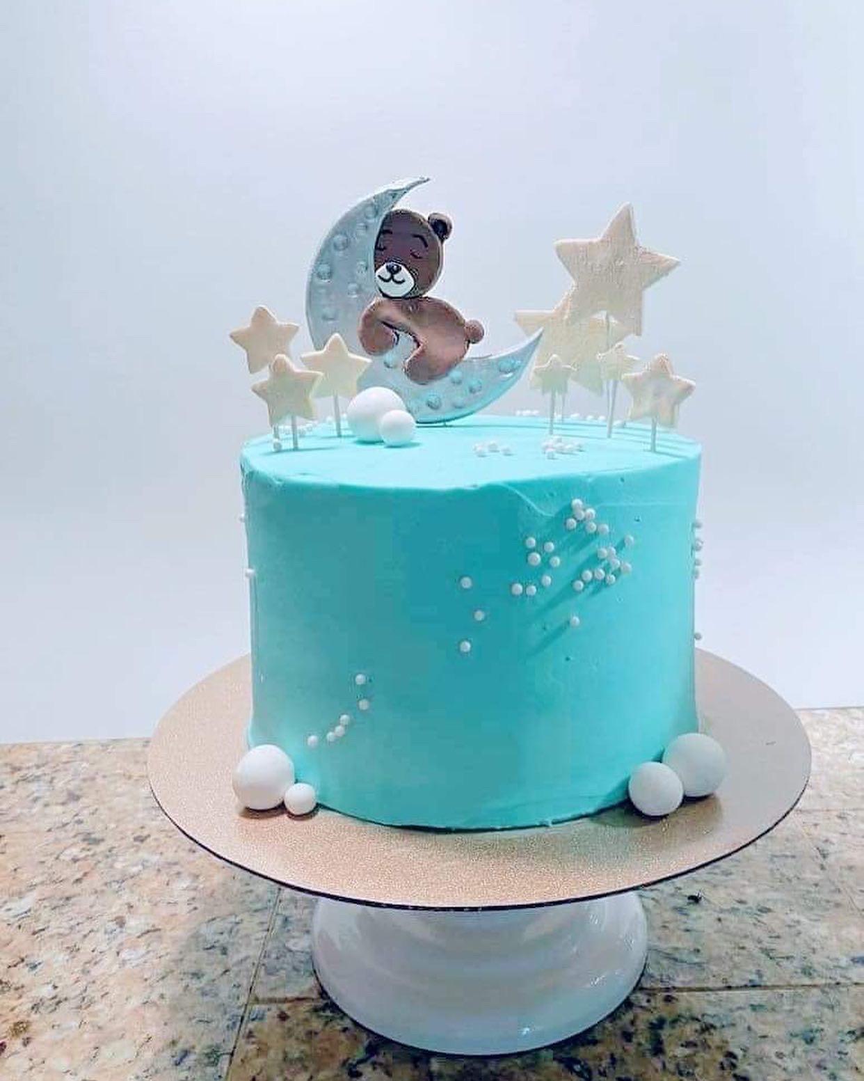 Bear on the moon baby shower cake